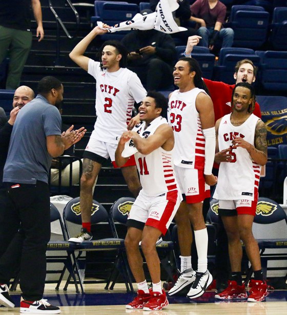 San Francisco City College celebrates its 91-66 victory over Sierra College.